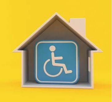 House with handicap space sign